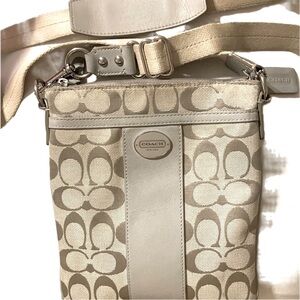 Coach crossbody messenger file bag in silver/ gray.